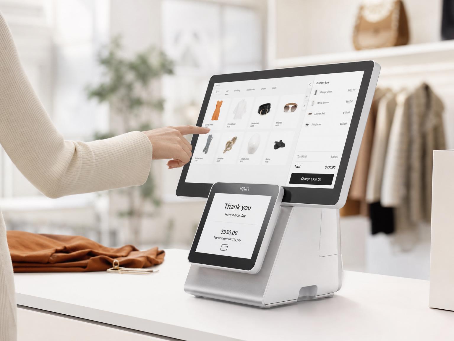 Clover Station Duo dual-screen point of sale system with merchant and customer-facing displays on a retail counter